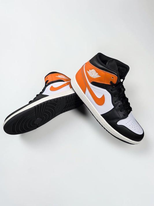 Air Jordan 1 Mid blanc vue de profil