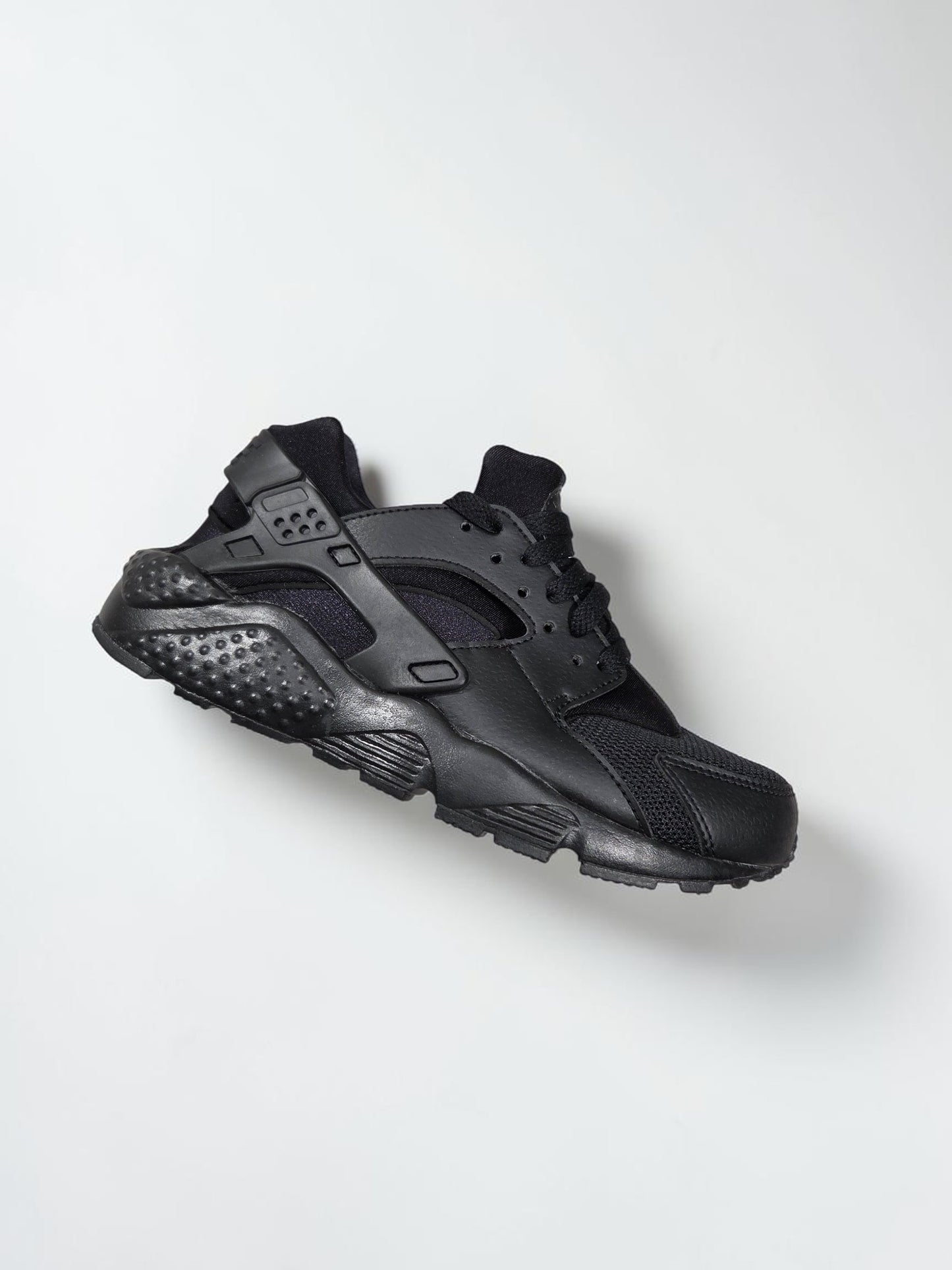 Nike Huarache Run GS noire noir vue trois quarts