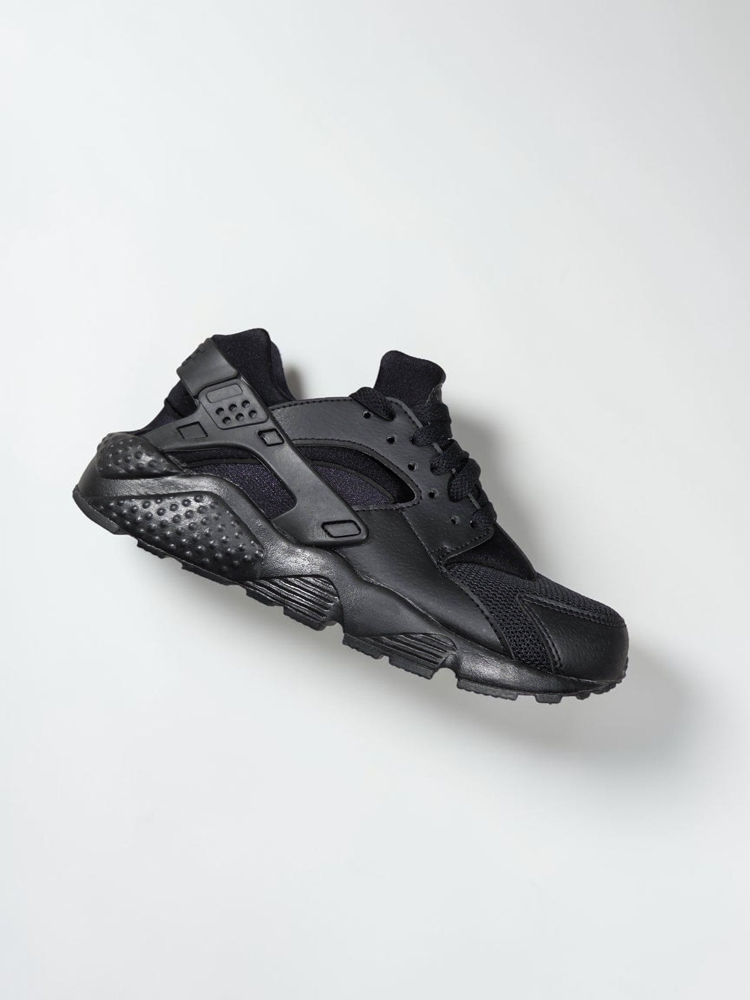 Nike Huarache Run GS noire noir vue trois quarts